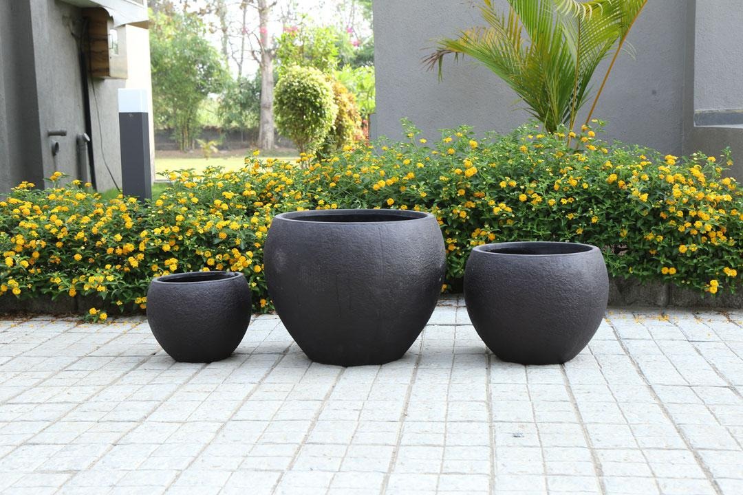 Set of upcycled plastic planters in different sizes